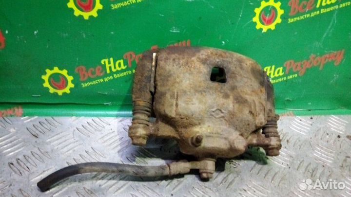 Суппорт передний правый Nissan Sunny седан 1.5