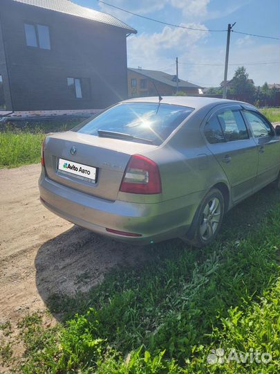 Skoda Octavia 1.6 AT, 2011, 240 296 км