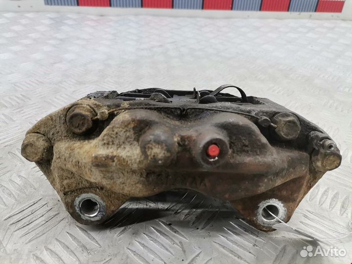 Суппорт передний левый Toyota Hilux 7 2008