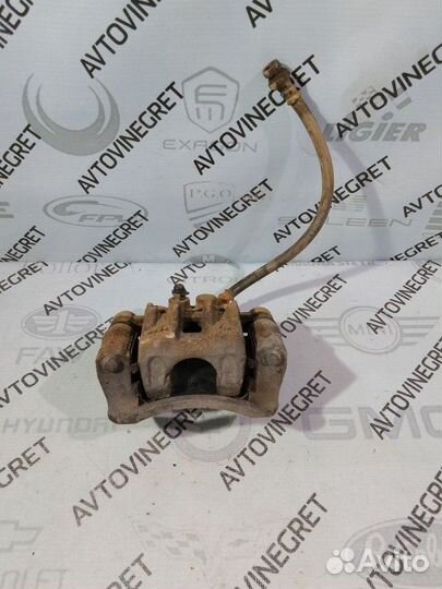 Суппорт тормозной задний Kia Cerato 1