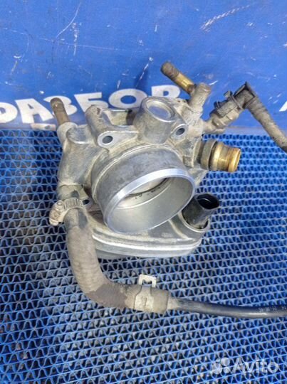 Дроссельная заслонка Opel Astra H купе Z18XER 2009