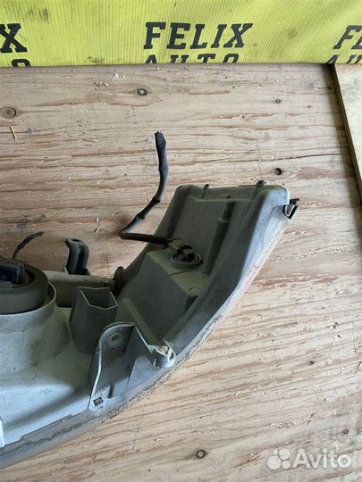 Фара левая Nissan Serena (pnc24) 1999-2005