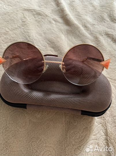 Солнечные очки женские