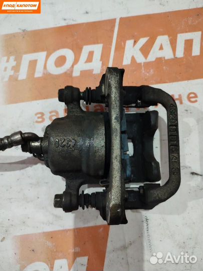 Суппорт тормозной задний левый Suzuki Grand Vitara