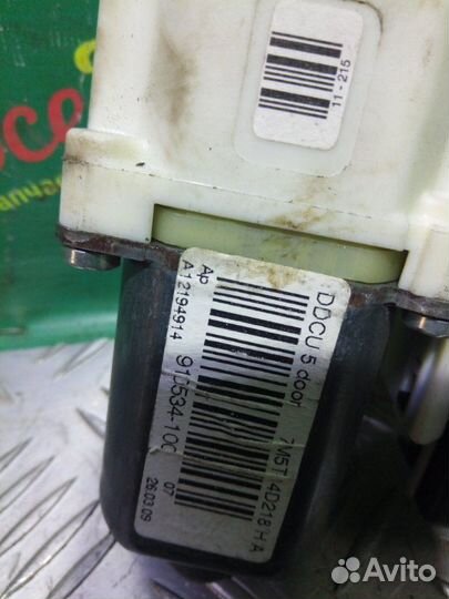 Моторчик стеклоподъемника передней левой двери