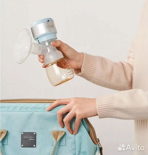 Молокоотсос электрический новый