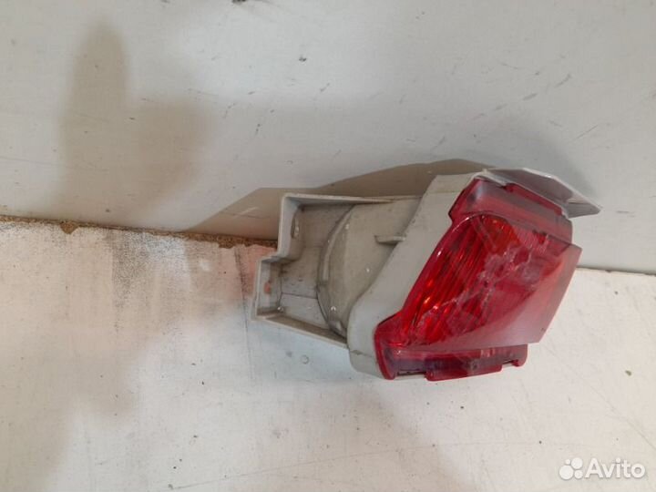 Фонарь противотуманный задний левый Toyota Land