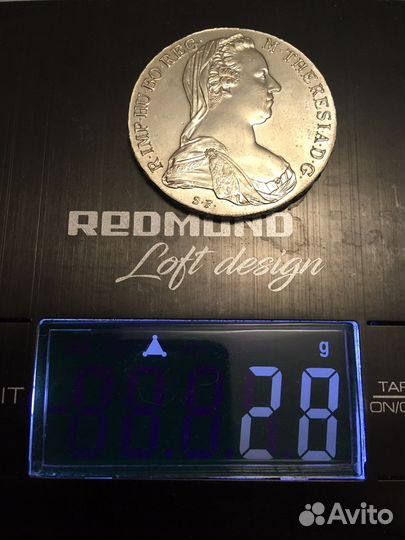 Монета серебряная