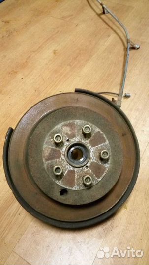 Кулак цапфа задний левый Subaru Tribeca 3.0