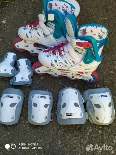 Роликовые коньки