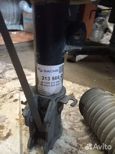 Амортизатор передний левый Opel Corsa D
