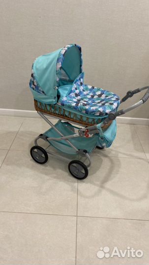 Детская игрушечная коляска