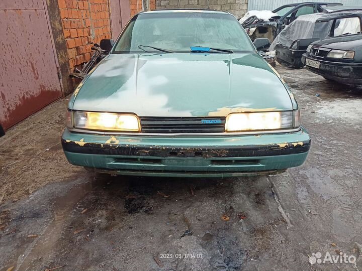 Фара передняя левая Мазда 626 GD 8BGK51040
