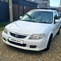 Mazda Familia 1.5 AT, 2001, 404 000 км, с пробегом, цена 310 000 руб.