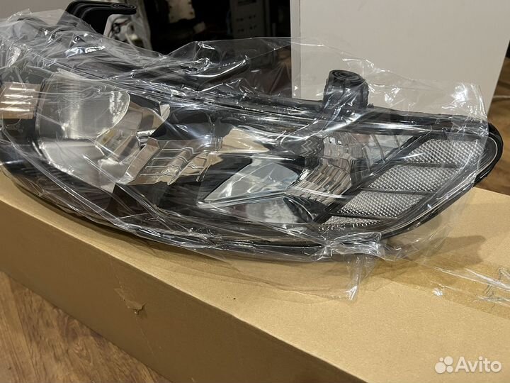 Фара левая Kia Cerato 2008-2013