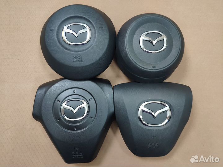 Заглушка руля Mazda 3 2012-2016