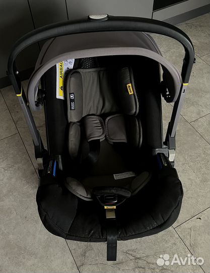 Коляска автокресло doona с базой isofix