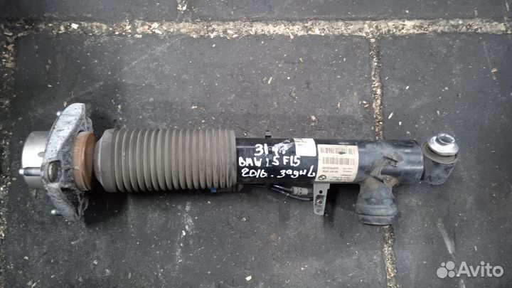 Амортизатор задний L BMW X5 F15 4,0TD 2016 года 40