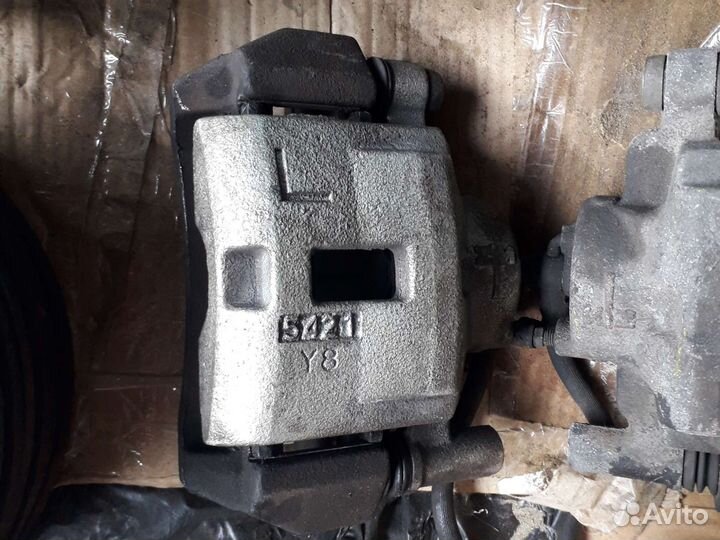 Суппорт передний Mazda 626