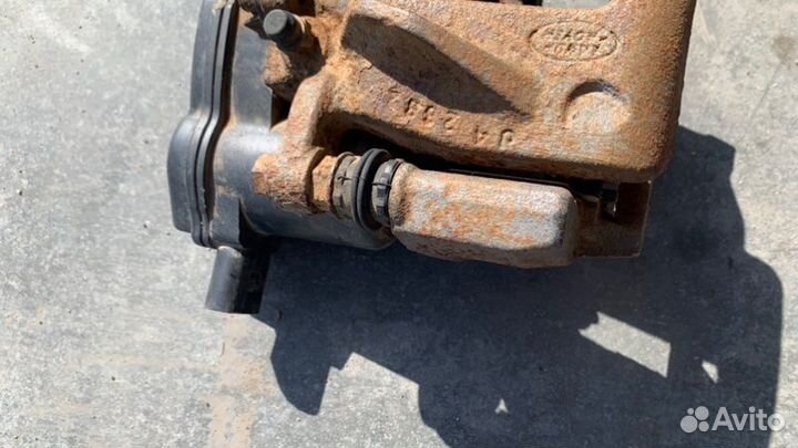 Суппорт тормозной задний левый Range Rover Evoque