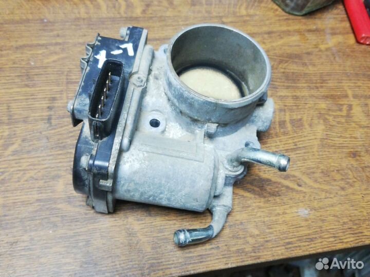 Дроссельная заслонка Митсубиси Лансер 10