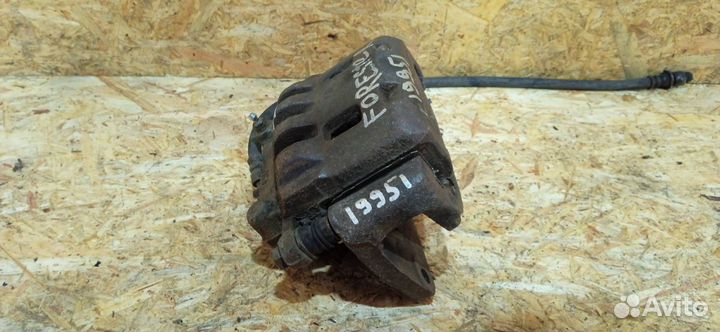 Суппорт тормозной передний левый Subaru Forester