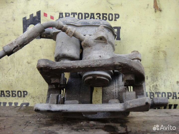 Суппорт тормозной задний левый Audi A4