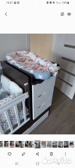 Детская кроватка с маятником