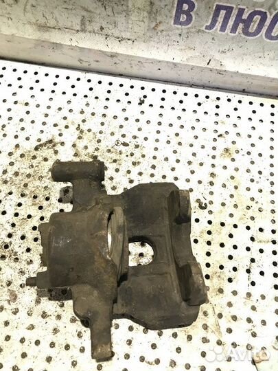 Суппорт передний левый Mazda 6GG 2.0