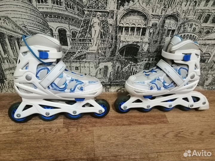 Роликовые коньки