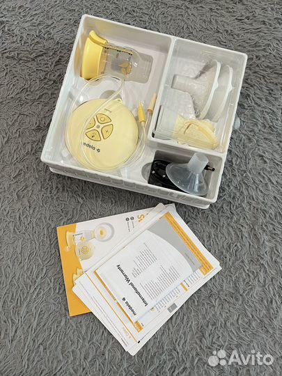 Молокоотсос medela swing flex электрический