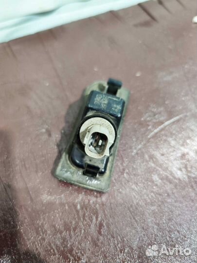 Фонарь подсветки номера Mitsubishi Pajero 4