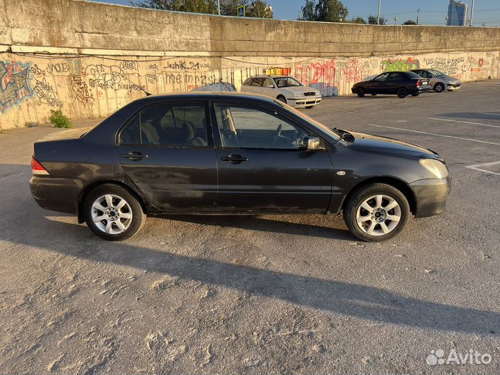 Mitsubishi Lancer 1.6 МТ, 2003, 400 000 км