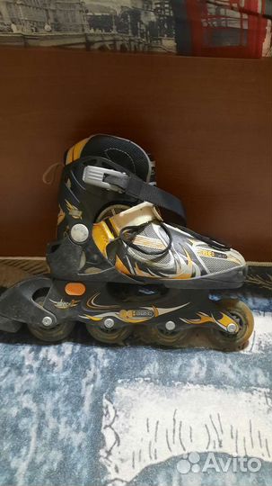 Роликовые коньки