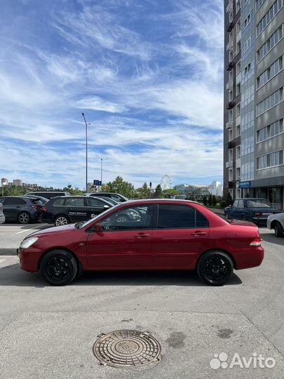 Mitsubishi Lancer 1.6 МТ, 2004, битый, 243 000 км