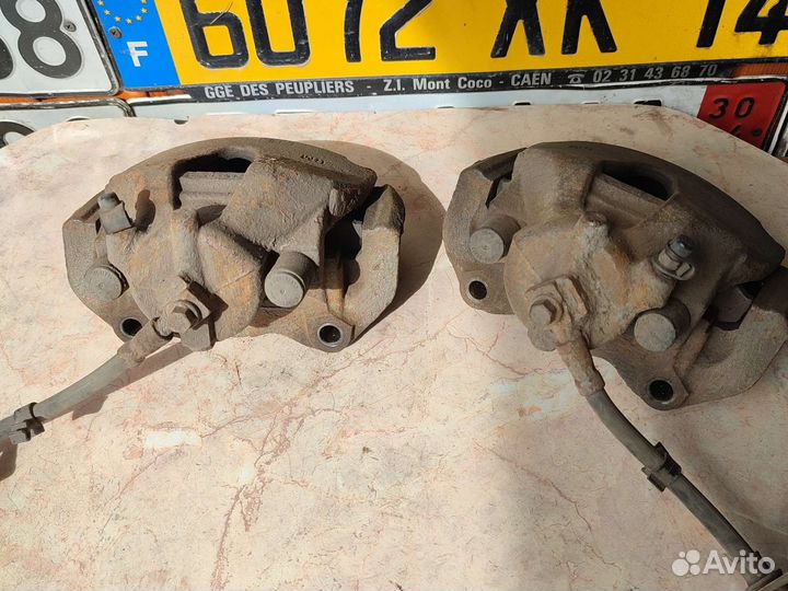 Opel astra Н тормозной суппорт