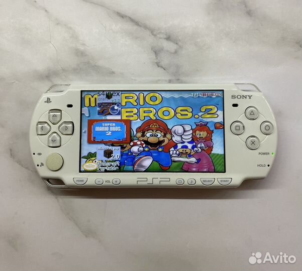 Sony PSP 2008 прошитая + 130 игр