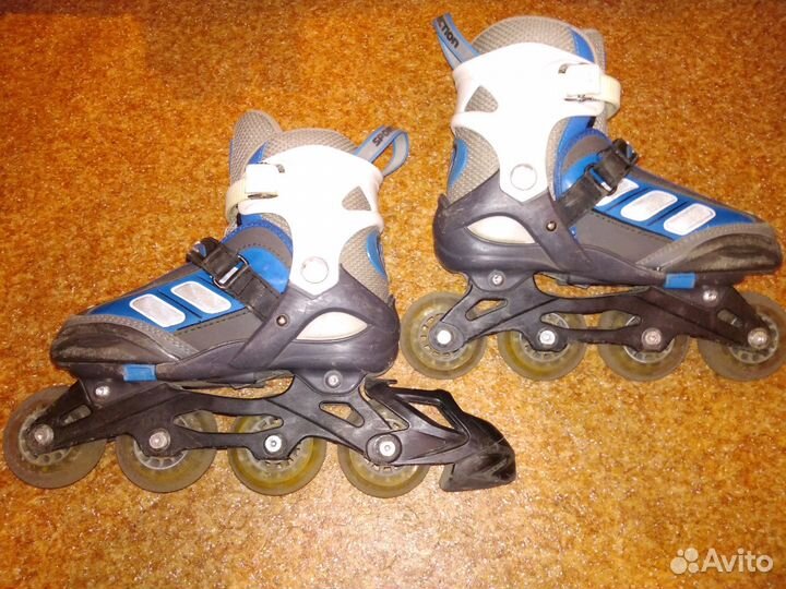 Роликовые коньки