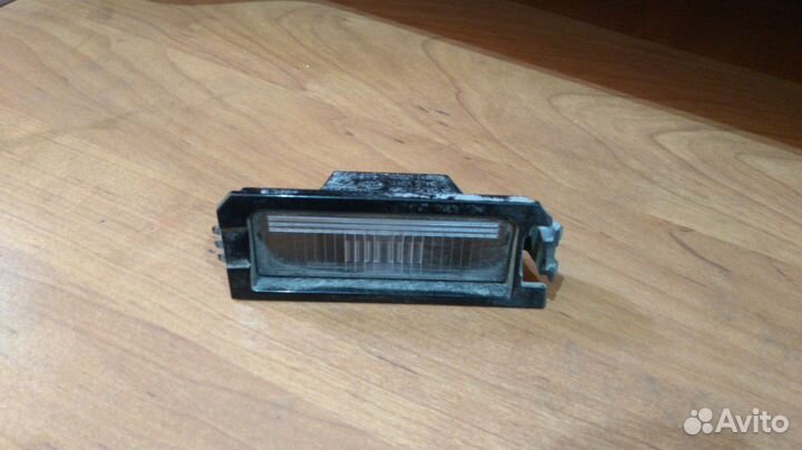 Фонарь подсветки номера правый Kia Rio 92502F6000