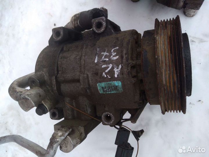 Компрессор кондиционера kia