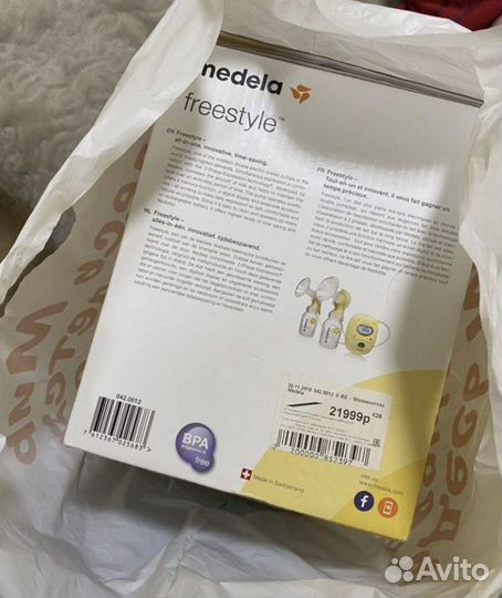 Молокоотсос medela новый