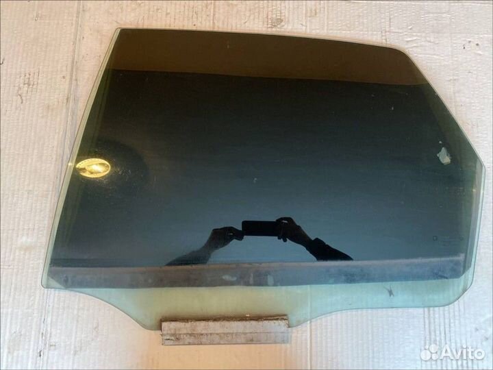 Стекло двери задней левой Opel Vectra