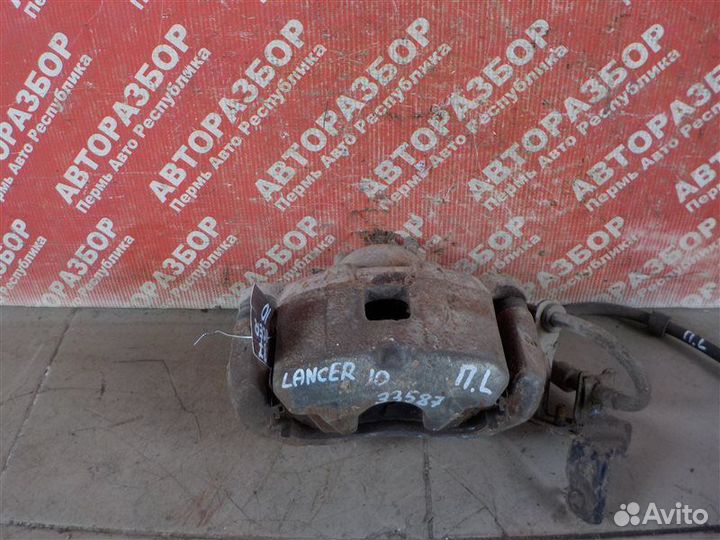 Суппорт тормозной передний левый Mitsubishi Lancer