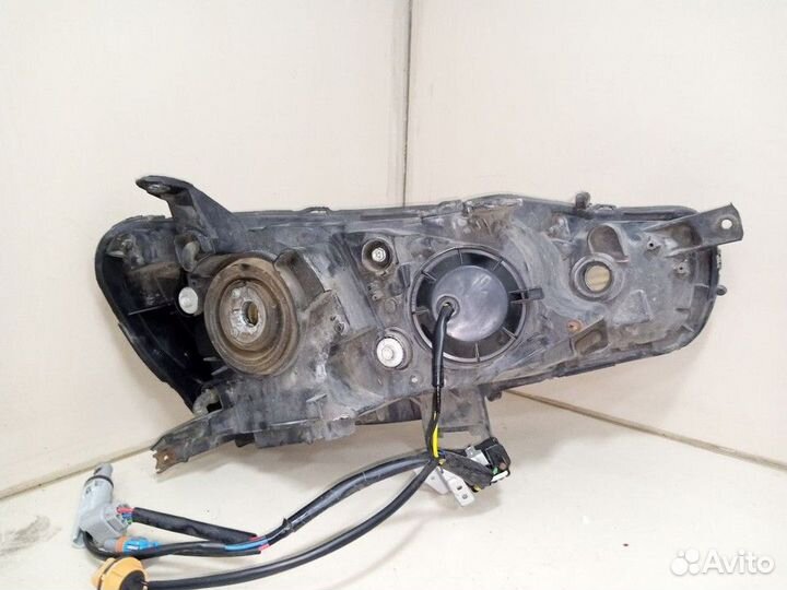 Фара передняя левая Mitsubishi Lancer