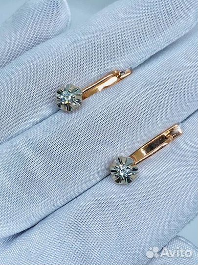Золотые серьги с камнем