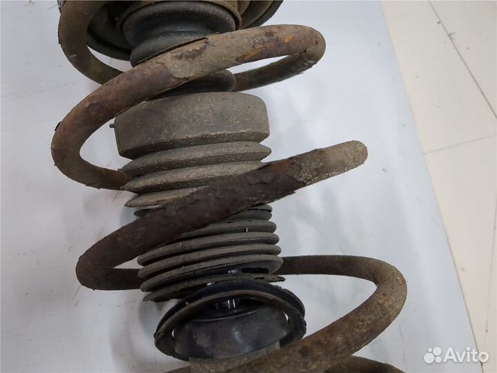 Амортизатор подвески Nissan Almera N16, 2005