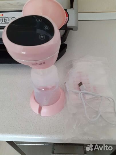 Молокоотсос электрический