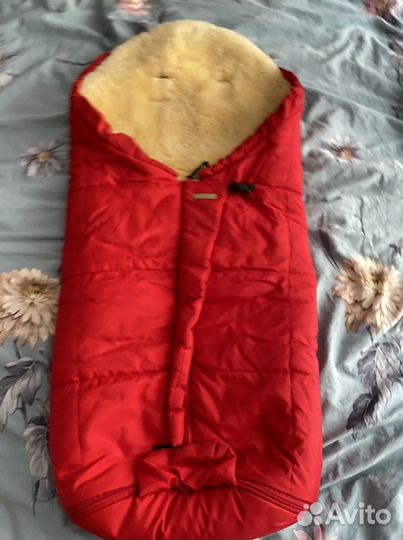 Меховой конверт из овчины в коляску Mansita