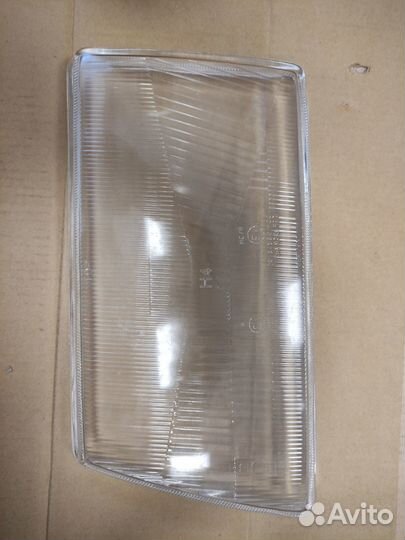 Стекло фары левой audi 100 83-90