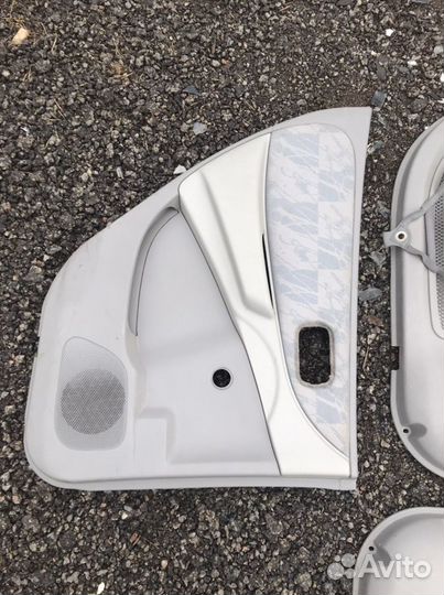 Nissan almera tino обшивки дверей